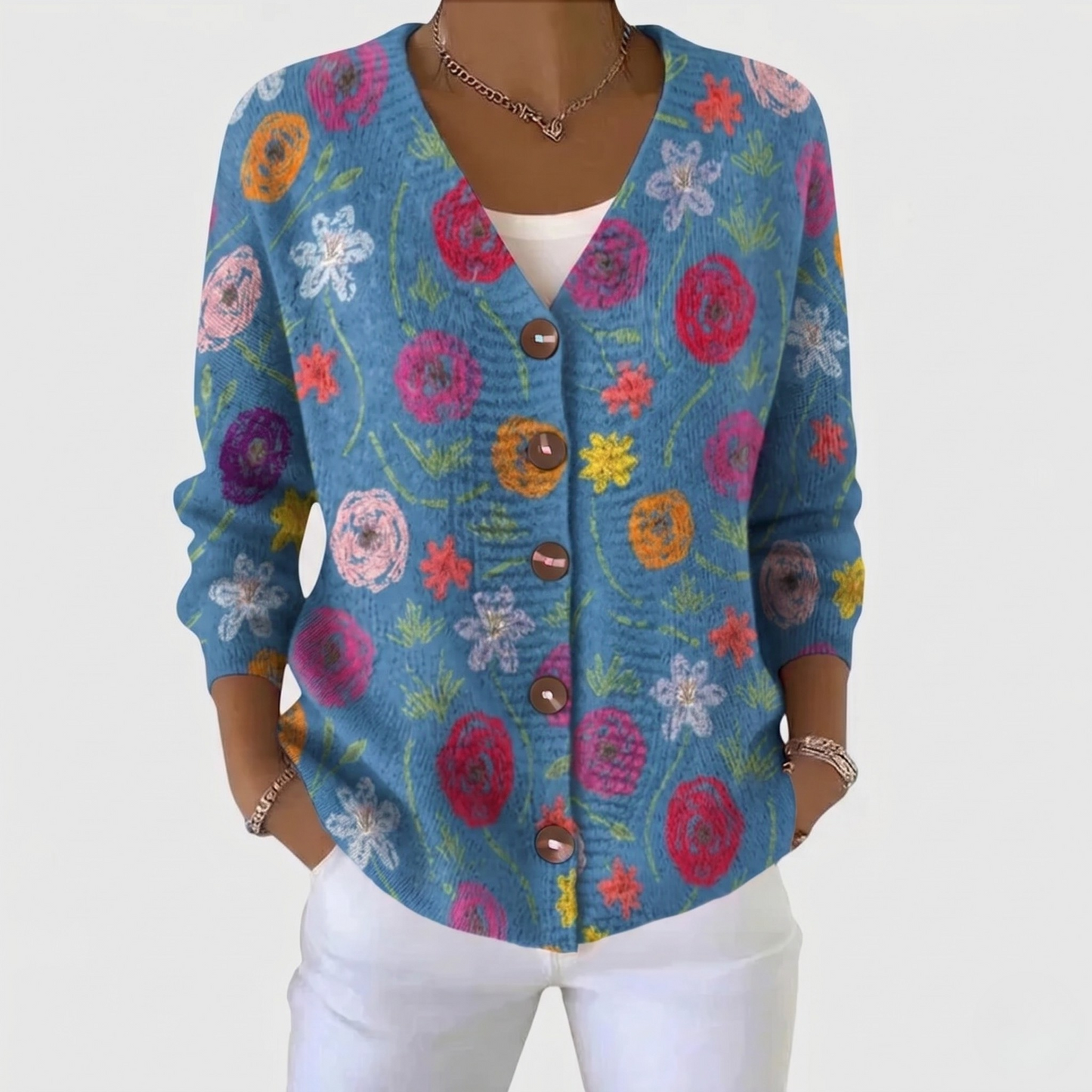 Tilda - Chaleco abierto azul con estampado floral