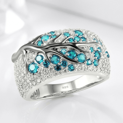 ANILLO DE HOJA DE TOPACIO AZUL Y PLATA