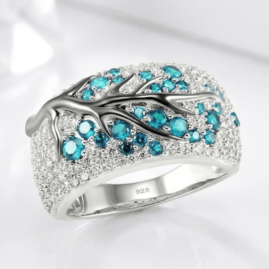 ANILLO DE HOJA DE TOPACIO AZUL Y PLATA