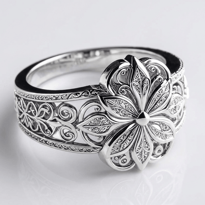 ANILLO DE PLATA CON FLOR Y CIRCONITA