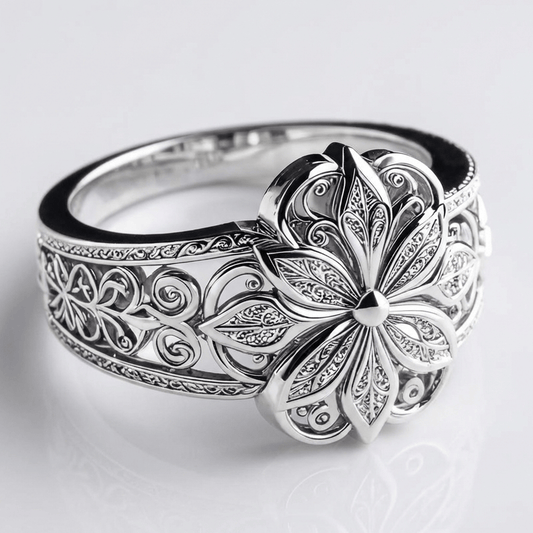 ANILLO DE PLATA CON FLOR Y CIRCONITA
