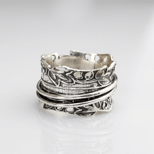 ANILLO DE PLATA CON CIRCONITAS EN CAPAS