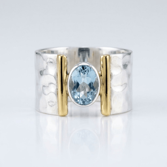 ANILLO MODERNO DE PLATA, ORO Y TOPACIO