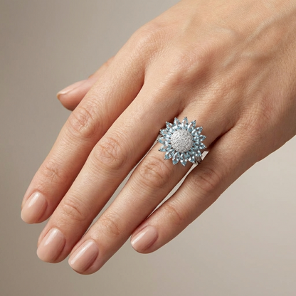 ANILLO DE FLOR DE TOPACIO AZUL Y PLATA