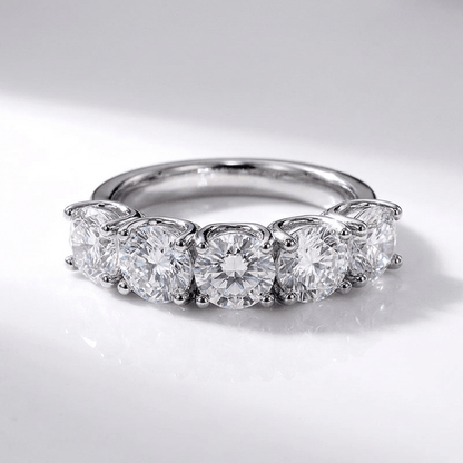 ANILLO REDONDO DE PLATA CON CINCO DIAMANTES