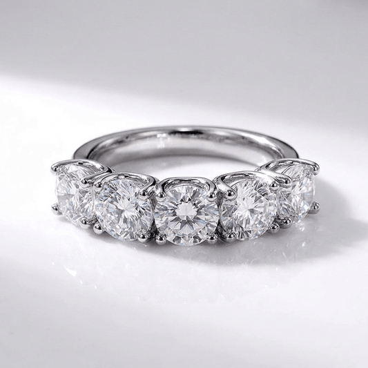 ANILLO REDONDO DE PLATA CON CINCO DIAMANTES