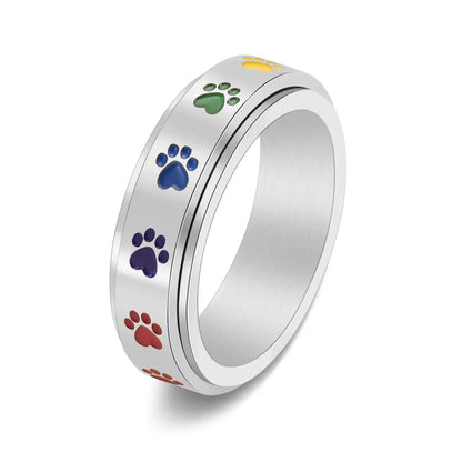 Anillo Giratorio Antiestrés Con Diseño De Pata – Acero Inoxidable Con Huellas De Patas Arcoíris