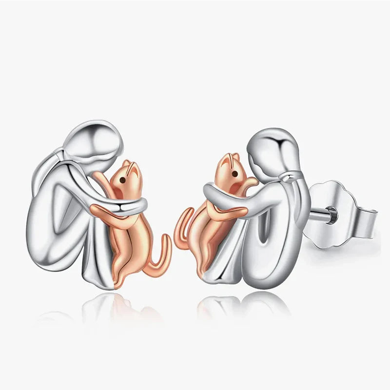 Pendientes De Plata Y Oro Bicolor Con Diseño De Abrazo De Gato.