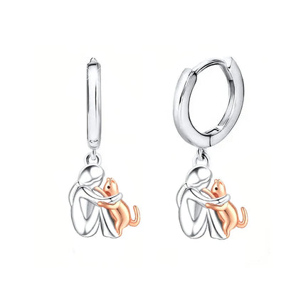 Pendientes De Plata Y Oro Bicolor Con Diseño De Abrazo De Gato.