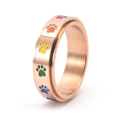 Anillo Giratorio Antiestrés Con Diseño De Pata – Acero Inoxidable Con Huellas De Patas Arcoíris