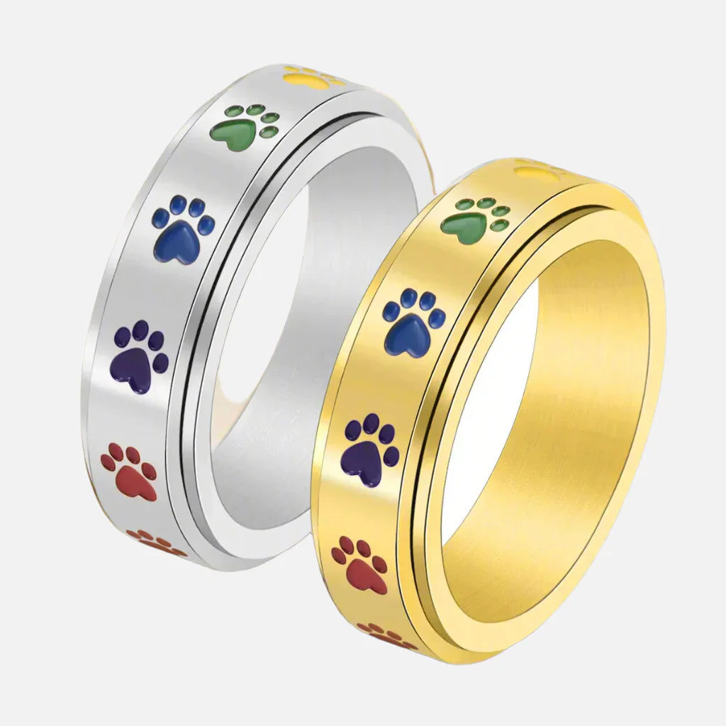 Anillo Giratorio Antiestrés Con Diseño De Pata – Acero Inoxidable Con Huellas De Patas Arcoíris